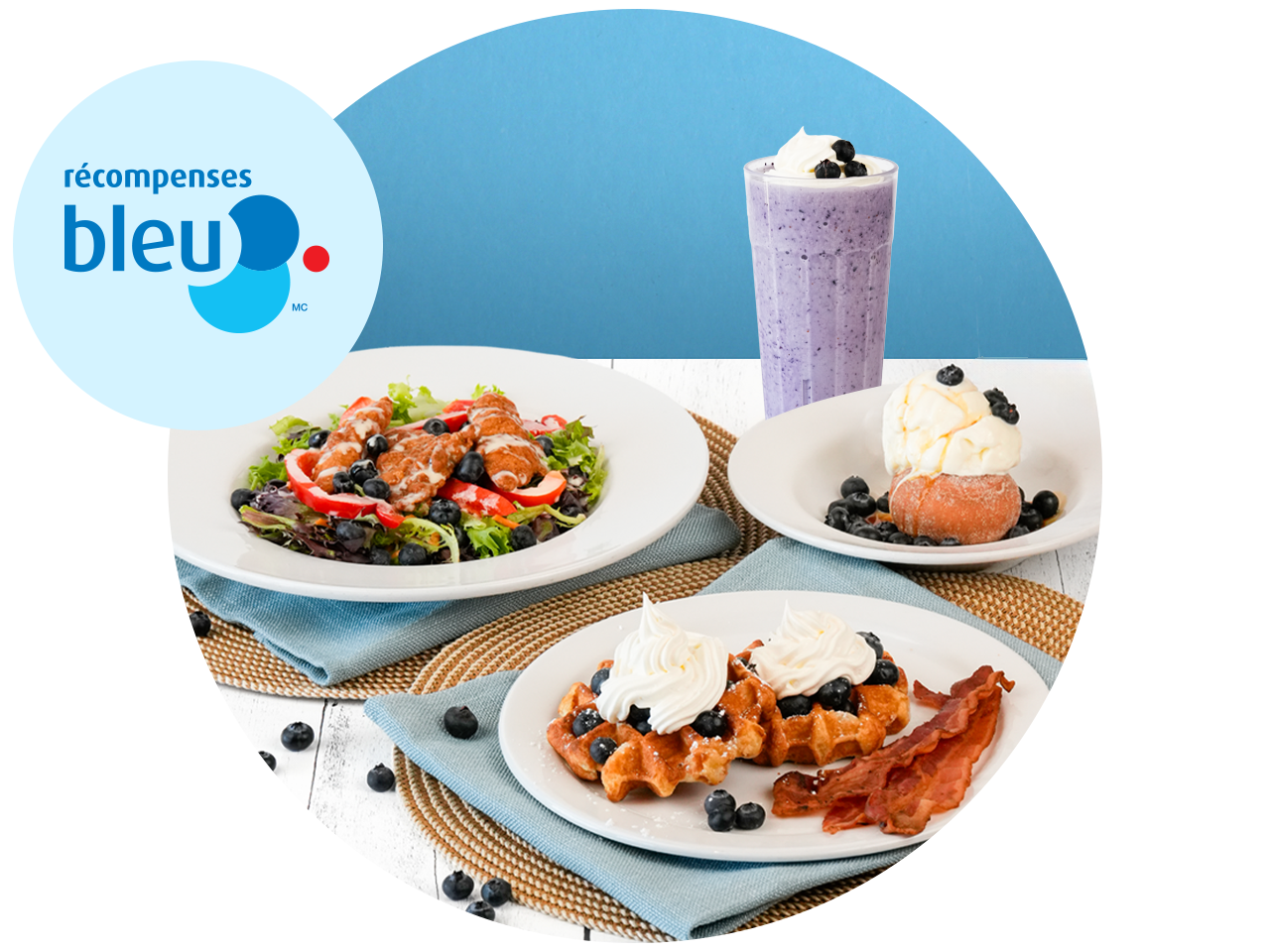 Three seafood platters with a blueberry milkshake.