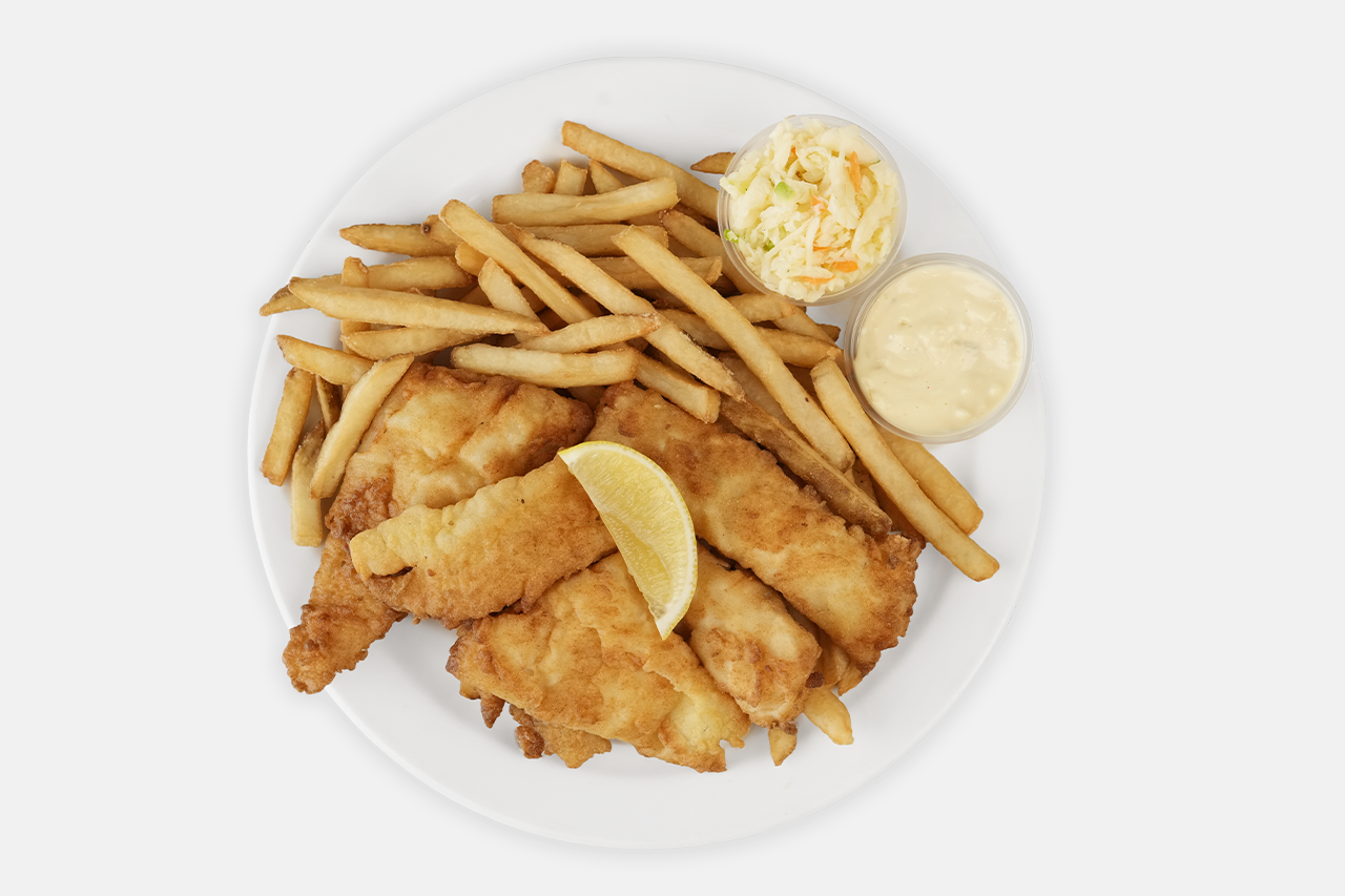 A picture of fish and chips with fries and colslaw and tartar sauce