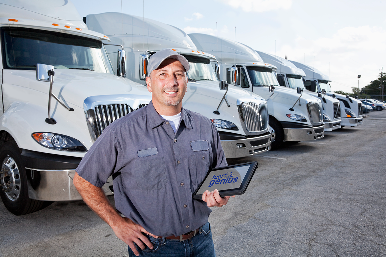 Fleet Driver picture in front of trucks in a row