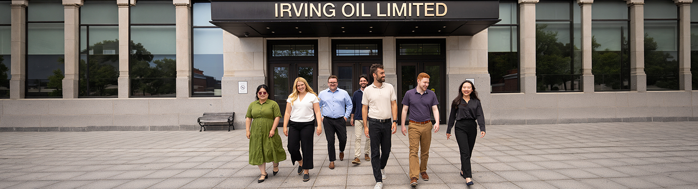 Employees walking outside the Irving Oil building