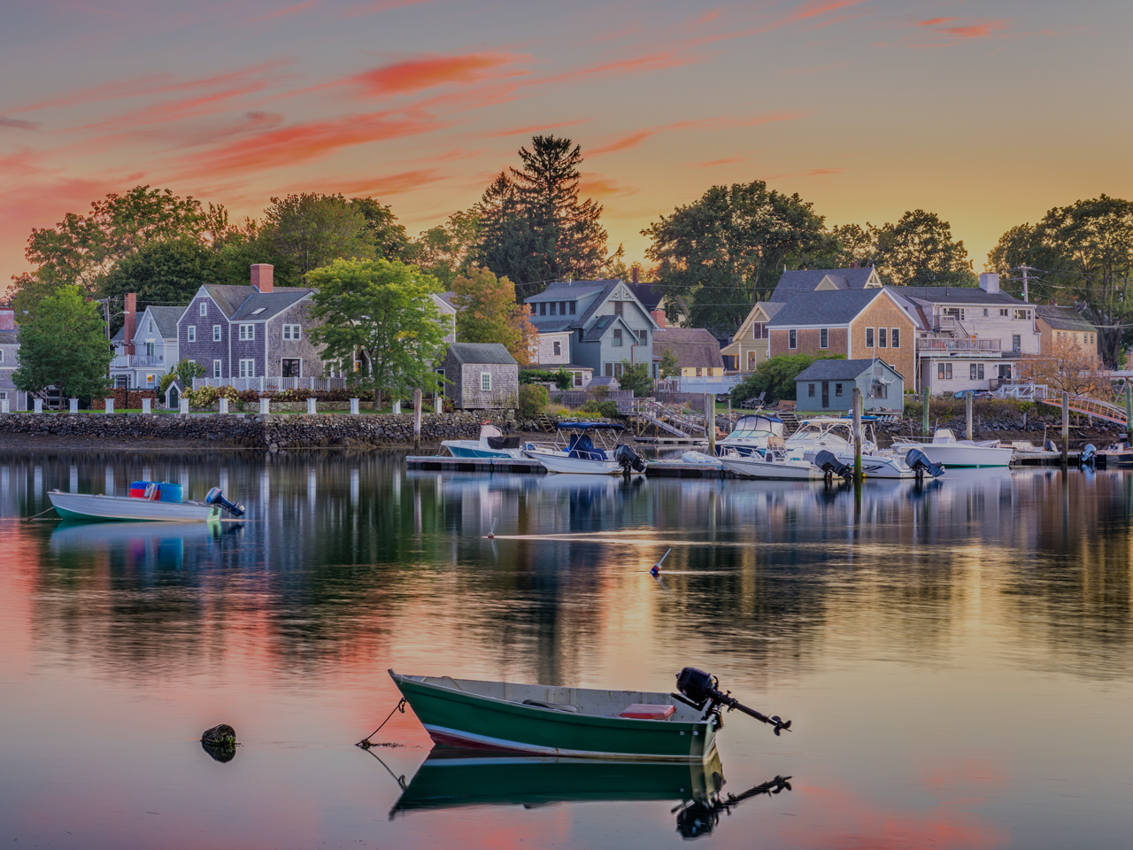 Beautiful sunset on small town with lake