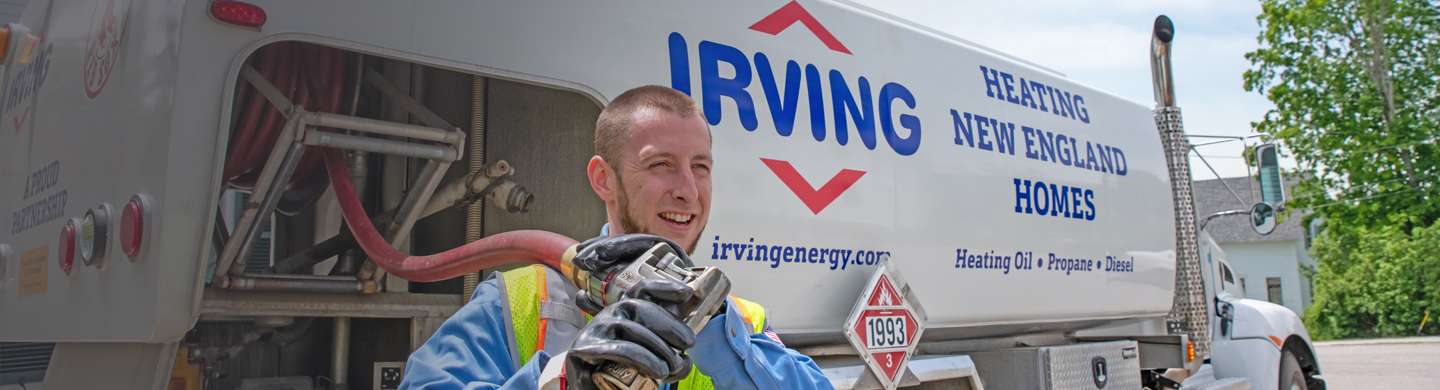 Irving Energy technician preparing to install heating fuel 