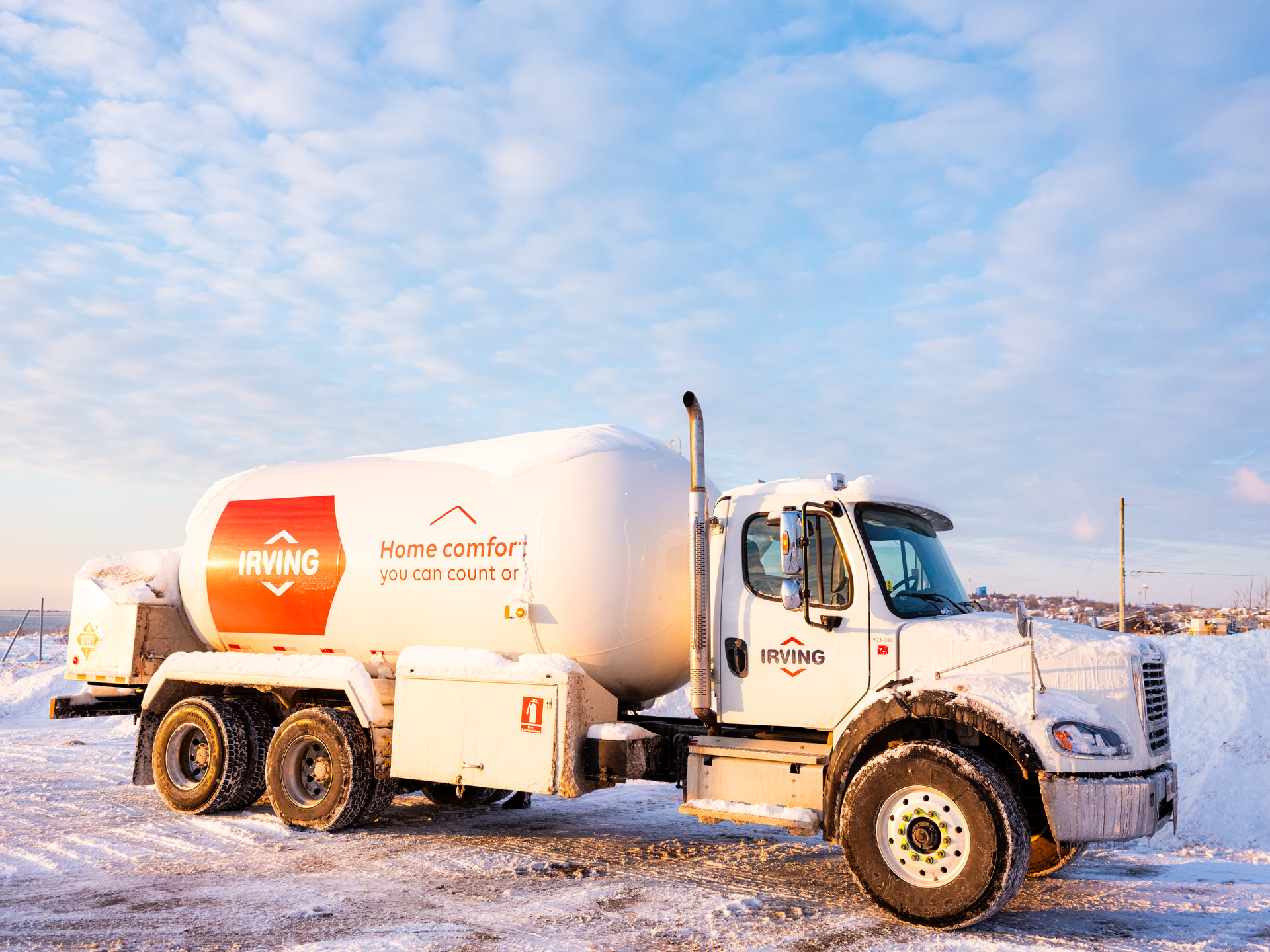 propane truck delivering to homes in winter