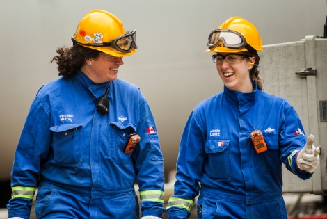 An irving employee and a customer signing documentation